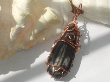 Ink Seas--Ancient Orthoceras fossil pendant wrapped in copper