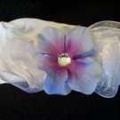 Periwinkle flower, white bow, white band