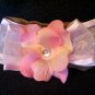 light pink flower, pink bow, brown band