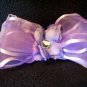 Dark purple flower, purple bow, purple band