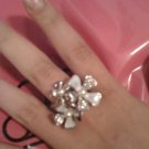 White and silver colored multi flower ring