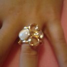 Gold ring with two gems