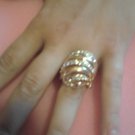 Gold ring with many gems