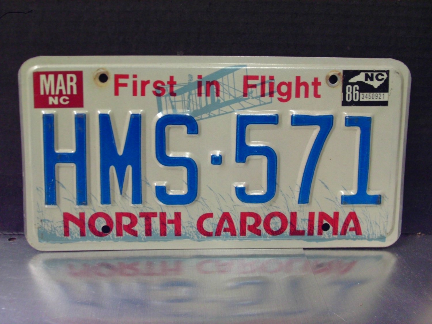1986 North Carolina Passenger License Plate NC HMS571 YOM EX NC4