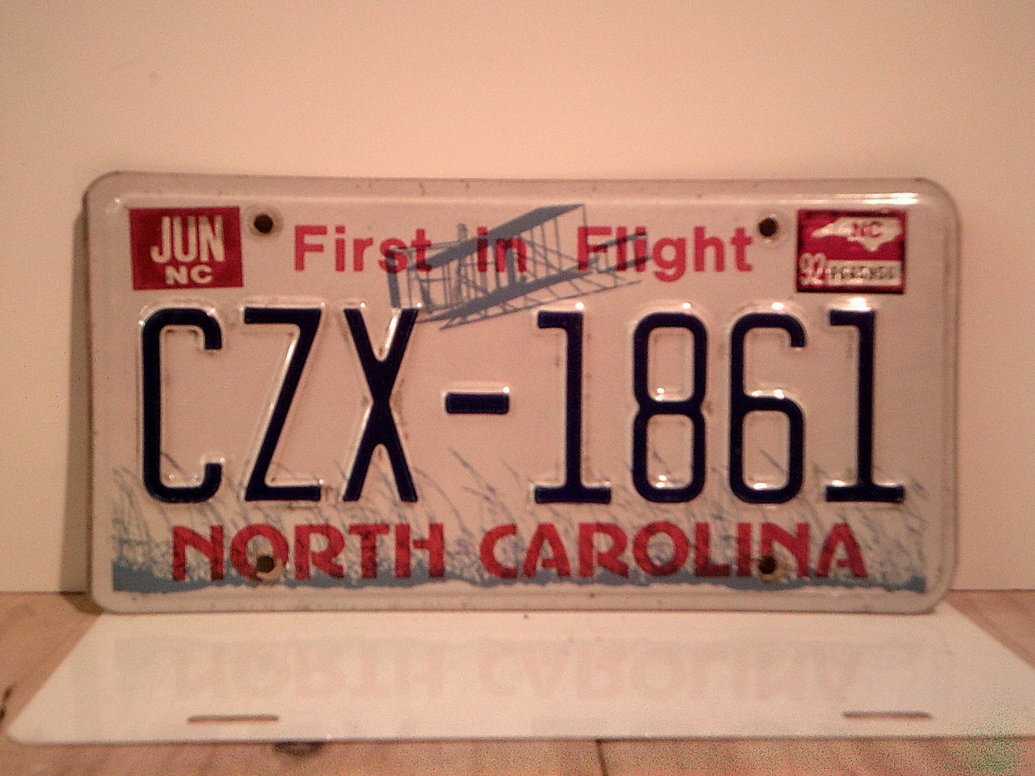 1992-north-carolina-nc-first-in-flight-license-plate-czx-1861