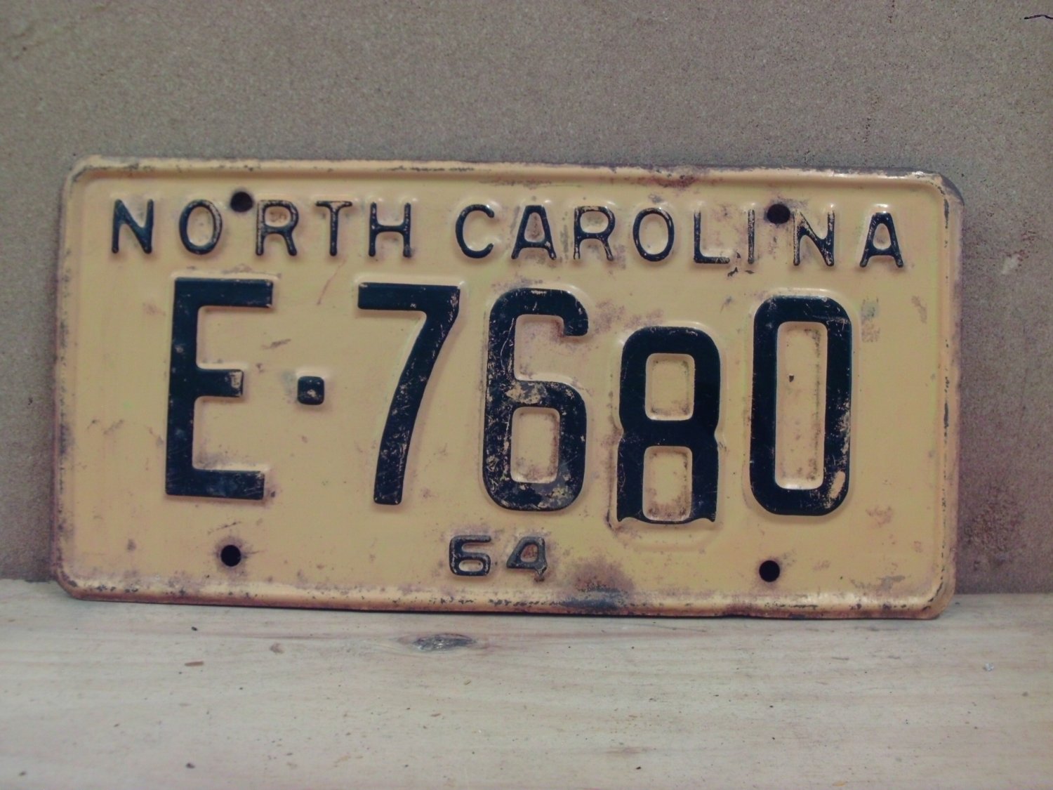 1964 North Carolina NC Error License Plate E-7680 Misaligned NCO1
