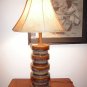 A 1960's Walnut fixture  and ceramic table lamp