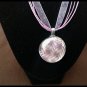 Glass pendant necklace on ribbon cord necklace