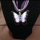 Purple butterfly pendant on adjustable ribbon cord
