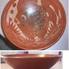 Brown Ceramic Bowl with Fish Design