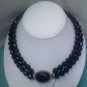 Vintage faceted black glass necklace with beautiful decorative clasp