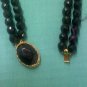 Vintage faceted black glass necklace with beautiful decorative clasp