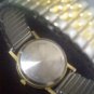 Men's Helbros INVINCIBLE black and gold watch with gold and silver Speidel stretch band