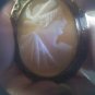 Antique hand carved shell cameo set in goldtone vintage pin brooch