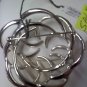 Sarah Coventry vintage brooch pin Tailored Swirl silvertone