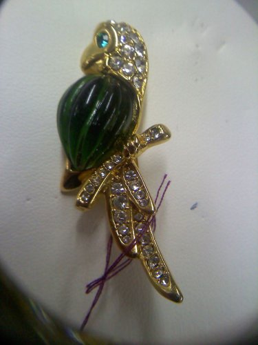 Parrot with green jelly belly with rhinestone eye and covered in rhinestones brooch pin