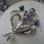 Sparkly blue aurora borealis bouquet by Dodds vintage brooch pin