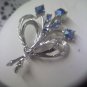 Sparkly blue aurora borealis bouquet by Dodds vintage brooch pin