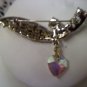 vintage Swoosh Aurora Borealis rhinestone silver brooch pin with dangling crystal heart