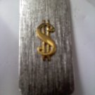 Vintage silvertone money clip with goldtone dollar sign