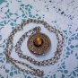 Avon vintage -Victorian Locket Necklace- with faux amber topaz in goldtone