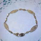 Marquise shaped link chain bracelet in goldtone Vintage Avon