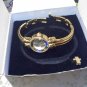 Avon "Birthstone Watch Simulated Sapphire - September" in goldtone 1999 New in box
