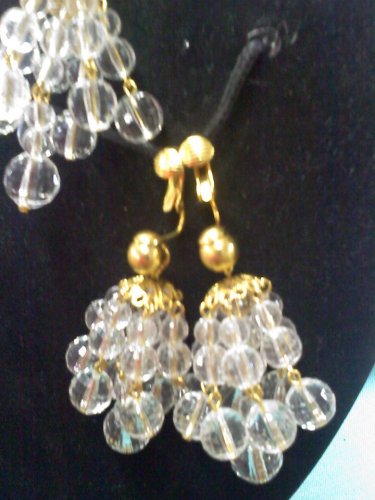 Avon clear faux crystal chandelier clip earrings on goldtone from 1992