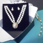 1995 Avon "Tailored Elegance Gift Set Pearl" and rhinestones necklace and post earrings set goldtone