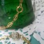 54 inch vintage Aurora Borealis crystal necklace on goldtone filigree chain