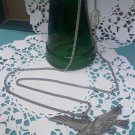 Cathedral Genuine Pewter seagull pendant on a 30 inch long chain vintage necklace 1970's