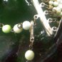 7 strand Lucite, faux pearl and marble... green necklace with clip earrings - Japan