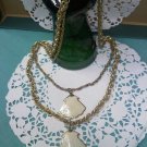 Whiting & Davis twisted link two chain gold tone vintage necklace with real shell pendants