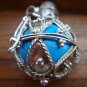 925 Silver & Topaz Blue Harmony Ball Pendant HB-254-KT