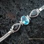 Sterling Silver Blue Topaz and Garnet Bracelet SBB-102-KT