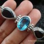 Sterling Silver Blue Topaz and Garnet Bracelet SBB-102-KT