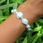 6.5 Inch 925 Silver and Seven Genuine Dominican Larimar Bracelet SBB-529-KT