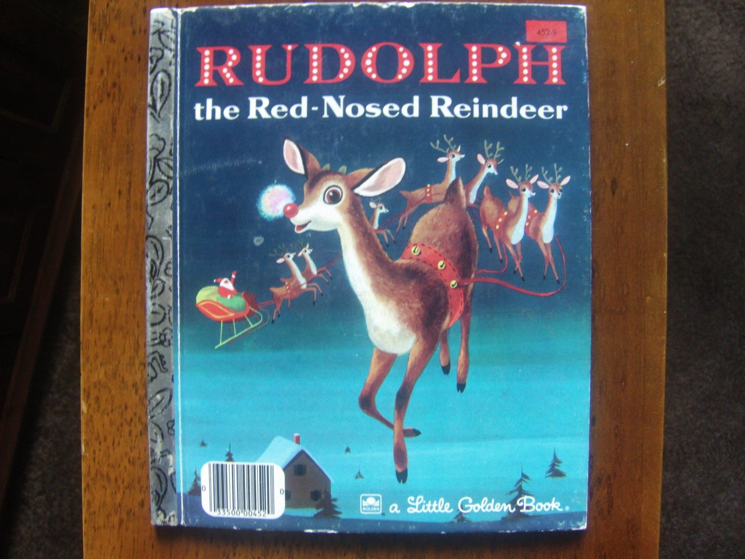 Rudolph the Red-Nosed Reindeer by Robert L. May