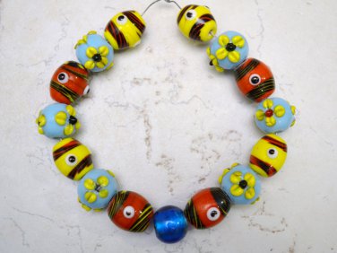 Red yellow and Blue Handmade Lampwork 14-16mm (Set of 15) Glass Beads A5