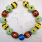 Red yellow and Blue Handmade Lampwork 14-16mm (Set of 15) Glass Beads A5