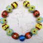 Red yellow and Blue Handmade Lampwork 14-16mm (Set of 15) Glass Beads A5