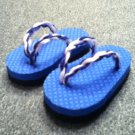 Baby Blue And Black Flip Flops With Blue And White Straps