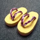 Baby Yellow And Pink Flip Flops With Purple straps