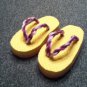 Baby Yellow And Pink Flip Flops With Purple straps