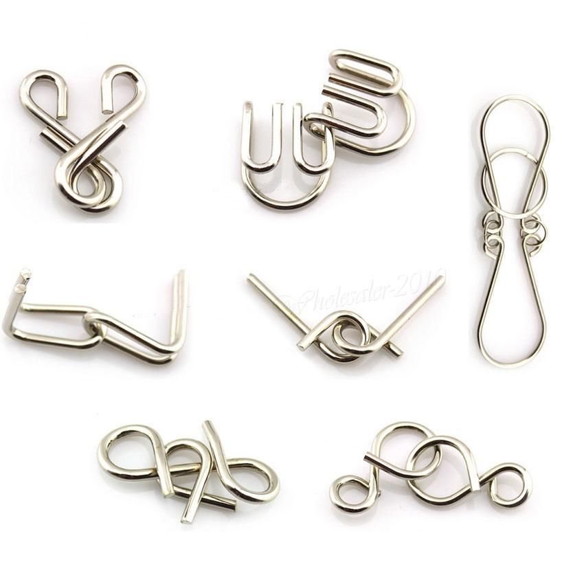 7 Sets IQ Test Toys Mind Game Brain Teaser Metal Wire Puzzles Magic