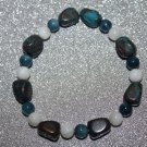 Fresh water pearls and quartzite