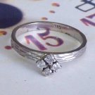 14k White Gold 4 Diamond Ring.