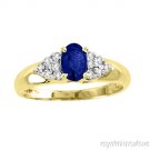 Oval Sapphire and Diamond Ring set in 14K Green Gold