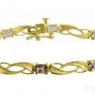 Color Change Garnet Tennis Bracelet 10K Yellow Gold