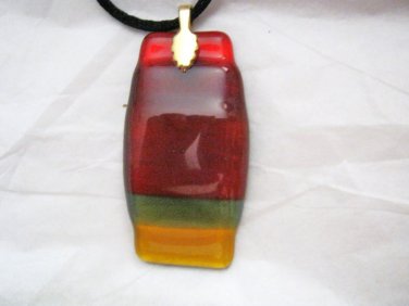 Abstract orange red green yellow fused glass 2" x 1" large pendant USA